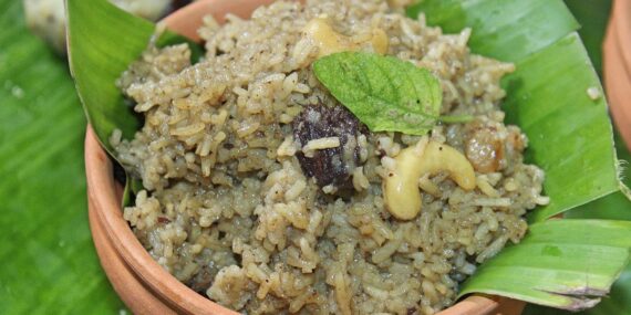 Traditional Odia Kanika – Sweet Rice with Ghee and Raisins”